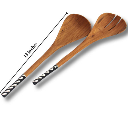 Same design as described in the first image of salad server set. There is a vertical line across the spreader that reads 13 inches.